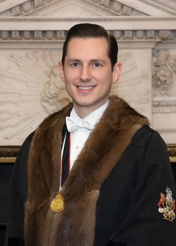 Liam Randall in livery gown.
