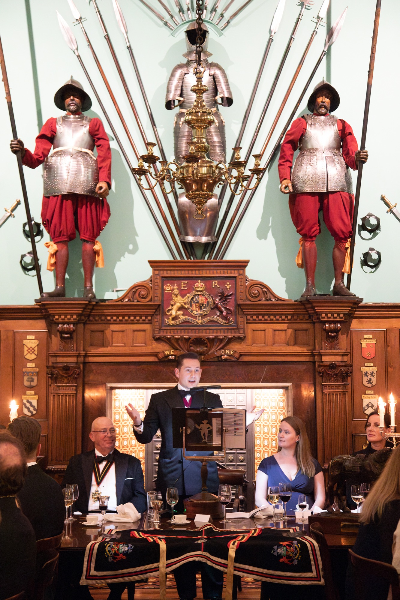 Delivering a Coopers' Company speech, flanked by the Company's yeomen guards.